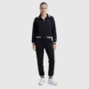 Blusa Pitcher de cuello alto con cremallera completa, C Logo