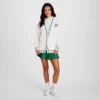 Cardigan Country Club, con logotipo floral «C» bordado