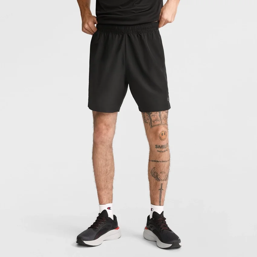 Pantalones cortos deportivos tejidos de 7"
