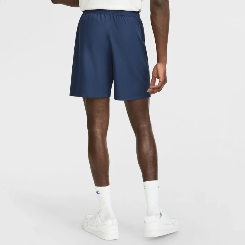 Pantalones cortos deportivos tejidos de 7"
