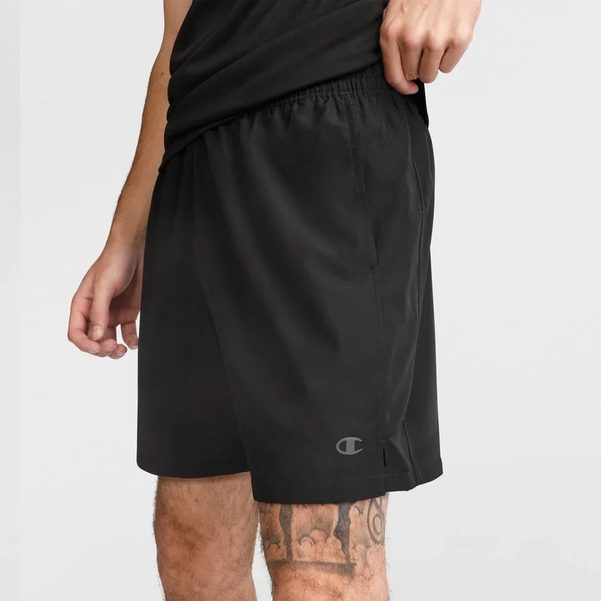 Pantalones cortos deportivos tejidos de 7"