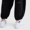 Pantalones voluminosos con cierre de botón a la frente Tackle